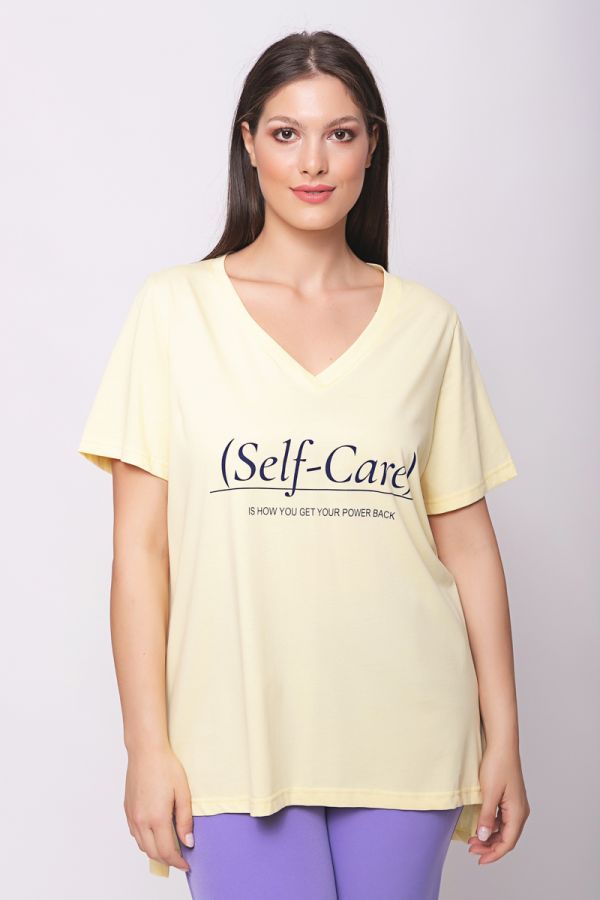 Κοντομάνικη μπλούζα με hi-lo τελείωμα σε κίτρινο χρώμα